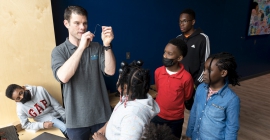 students look on at an instructor at the homewood community engagement center